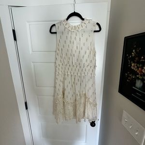 A Loves A Dillard’s White Halter dress with Gold & Silver Detailing